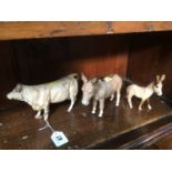 Two Beswick donkeys and a cow (3)