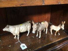 Two Beswick donkeys and a cow (3)