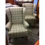 A pair of Parker Knoll tartan covered armchairs