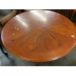 Circular dining table