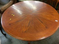 Circular dining table