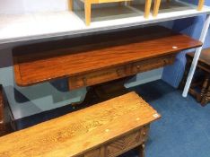 A good quality reproduction mahogany Chapmans 'Siesta' sofa table