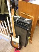 An electric guitar and amplifier