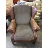 Worn leather brown armchair