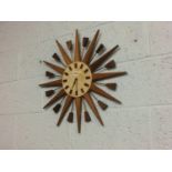 A Manley sun burst wall clock