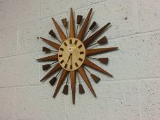 A Manley sun burst wall clock