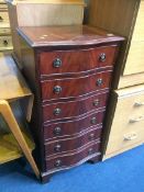 Reproduction mahogany serpentine chest of drawers