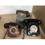 Three various telephones