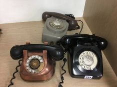 Three various telephones