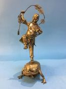 An unusual Oriental brass figure group