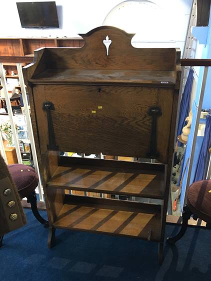 A narrow oak Art Nouveau style bureau, 71cm wide