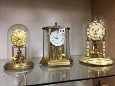 Three anniversary clocks