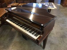 A Chappell of London baby grand piano