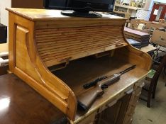 A pine tambour fronted desk