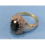 An 18ct gold diamond and sapphire ring, sapphire approx. 2.3 carat, size L