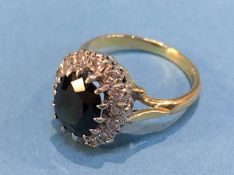 An 18ct gold diamond and sapphire ring, sapphire approx. 2.3 carat, size L