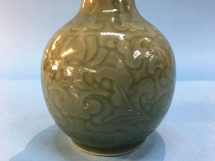 An Oriental tea glaze vase, character marks to base