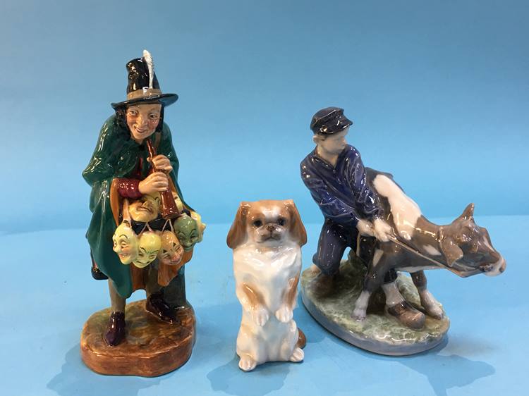 Royal Doulton 'The Mask Seller', Royal Copenhagen figure group and a Royal Doulton figure of a dog
