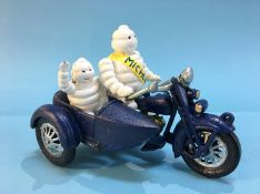 Cast Michelin man and a motorcycle combination
