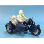 Cast Michelin man and a motorcycle combination