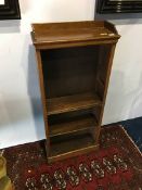 A mahogany narrow open bookcase