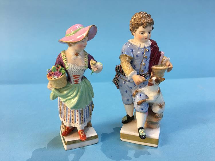 Pair of Continental porcelain figures of children, Meissen style marks to base of boy