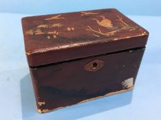 A lacquered jewellery box and contents