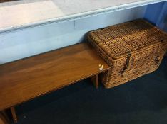 Oak table and a wicker basket