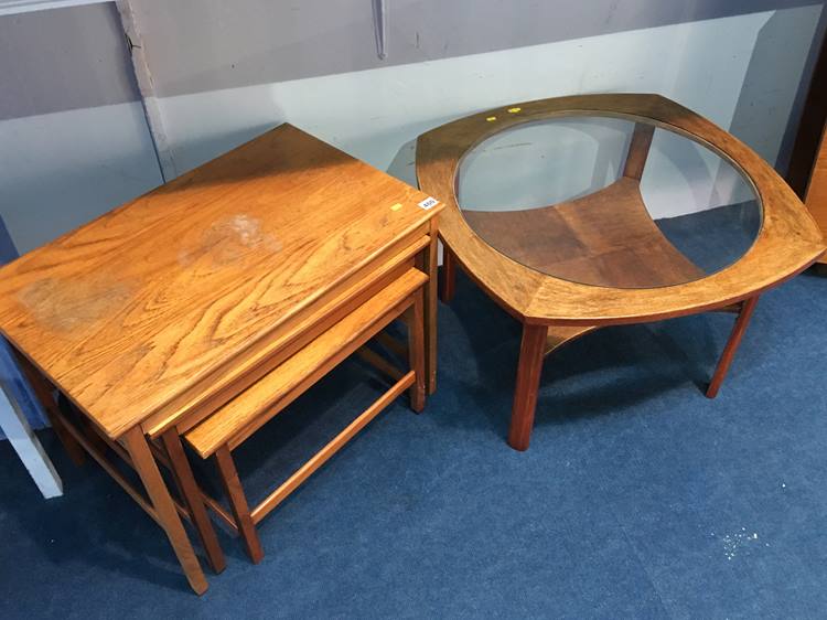 Teak and glass coffee table and a teak nest of tables