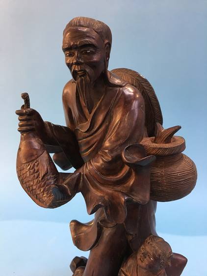 An Oriental 'Rootman' figure - Image 2 of 2