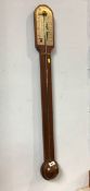 A mahogany stick barometer