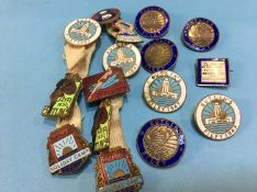 Collection of 16 enamelled Butlins badges