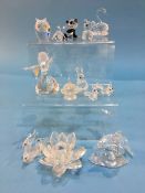 A collection of boxed Swarovski crystal ornaments