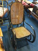 A late 19th century early 20th century Bentwood bergere rocking chair