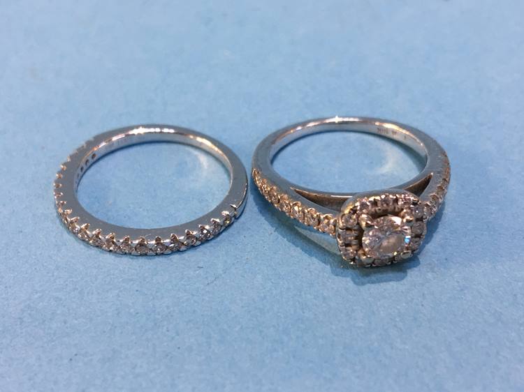 Two white metal and diamond rings, stamped '18k', size H