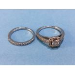 Two white metal and diamond rings, stamped '18k', size H