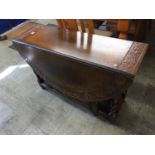 A good quality carved oak gateleg table