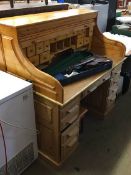 A pine tambour fronted desk