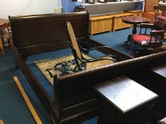 A double sleigh bed