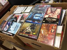 Two boxes of DVDs