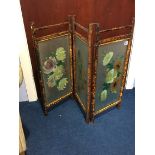 A Victorian three fold bamboo and painted glass fire screen