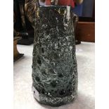 A pewter colour Whitefriars glass 'Volcano' vase, from the 'Textured' range, designed by Geoffrey