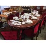 An Italian style dining table and eight chairs