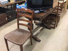 Oak drawer leaf table and four chairs