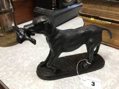 Cast figure of a dog