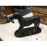 Cast figure of a dog