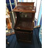 An Edwardian mahogany coal scuttle