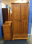 Two pine wardrobes and top boxes