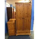 Two pine wardrobes and top boxes