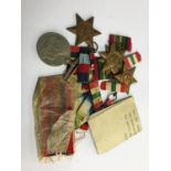 World War II unnamed group of medals including; Atlantic, Pacific and Italy Stars